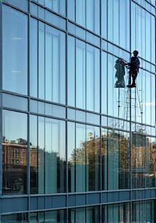 Window cleaning on commercial building in Manchester